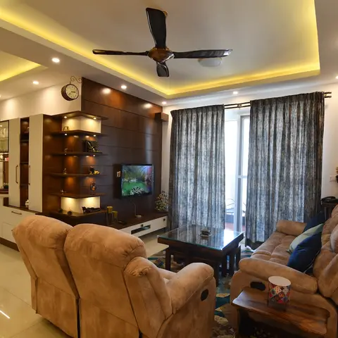 beige modern indian living room with cove — real Indian home