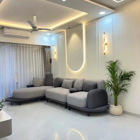 grey modern minimalist living room with cove — real Indian home