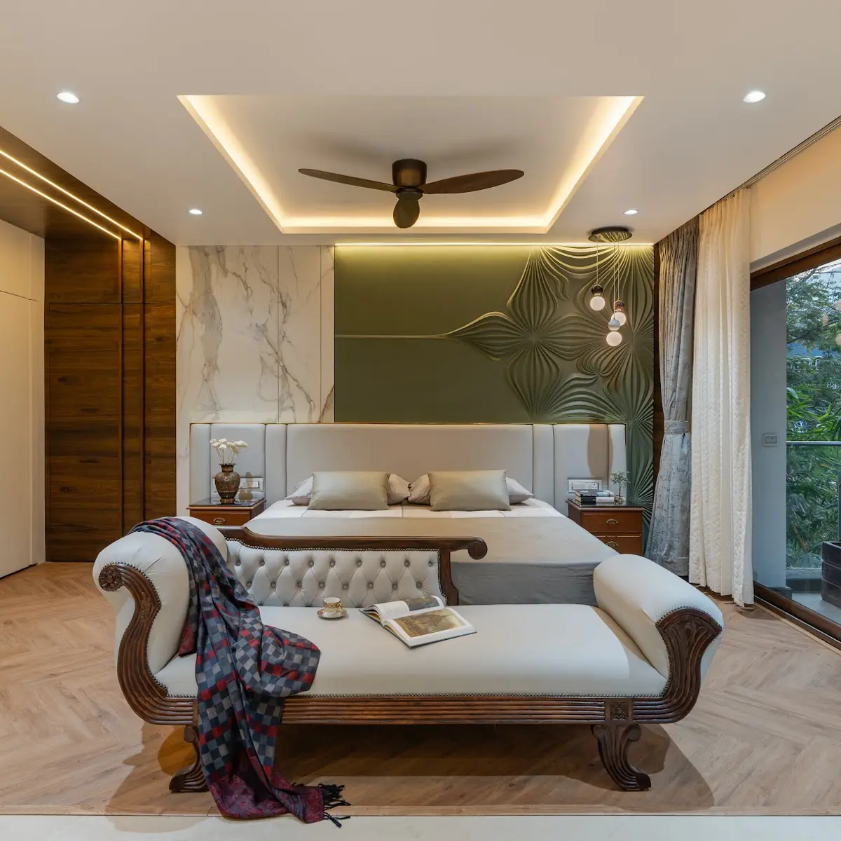 Bedroom with textured olive accent wall behind the bed