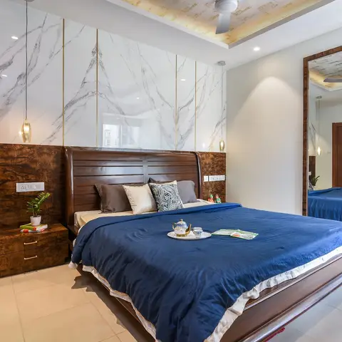 beige modern indian master bedroom with cladding — real Indian home