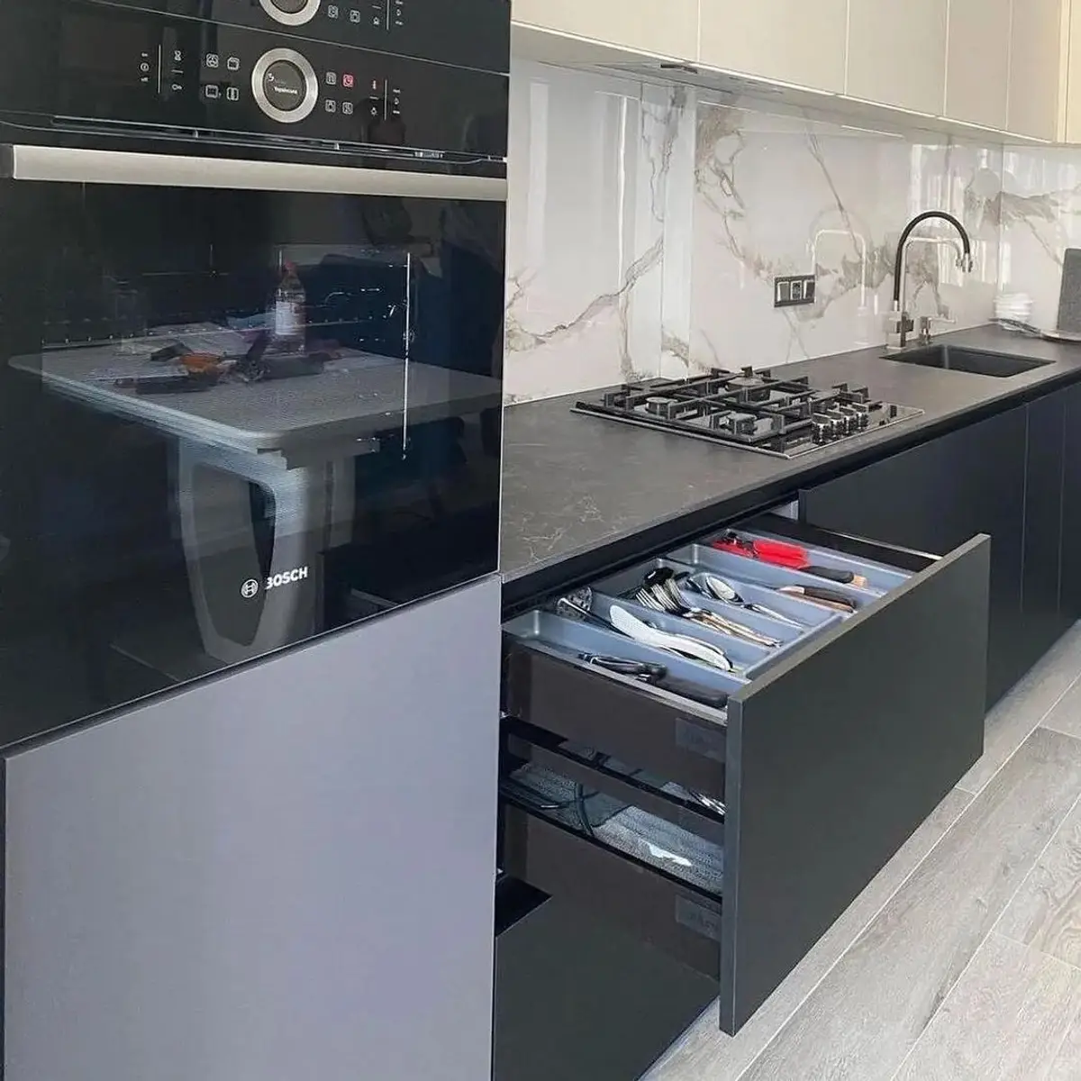 black and white modern minimalist kitchen with shutter — real Indian home
