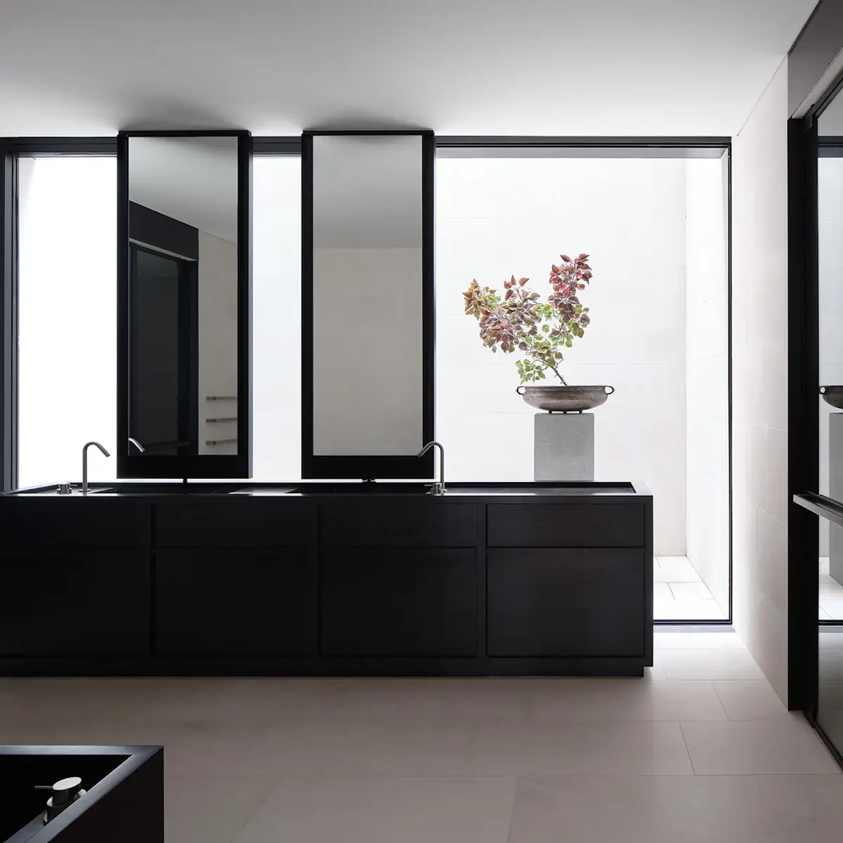 black and white modern minimalist bathroom with vanity — real Indian home