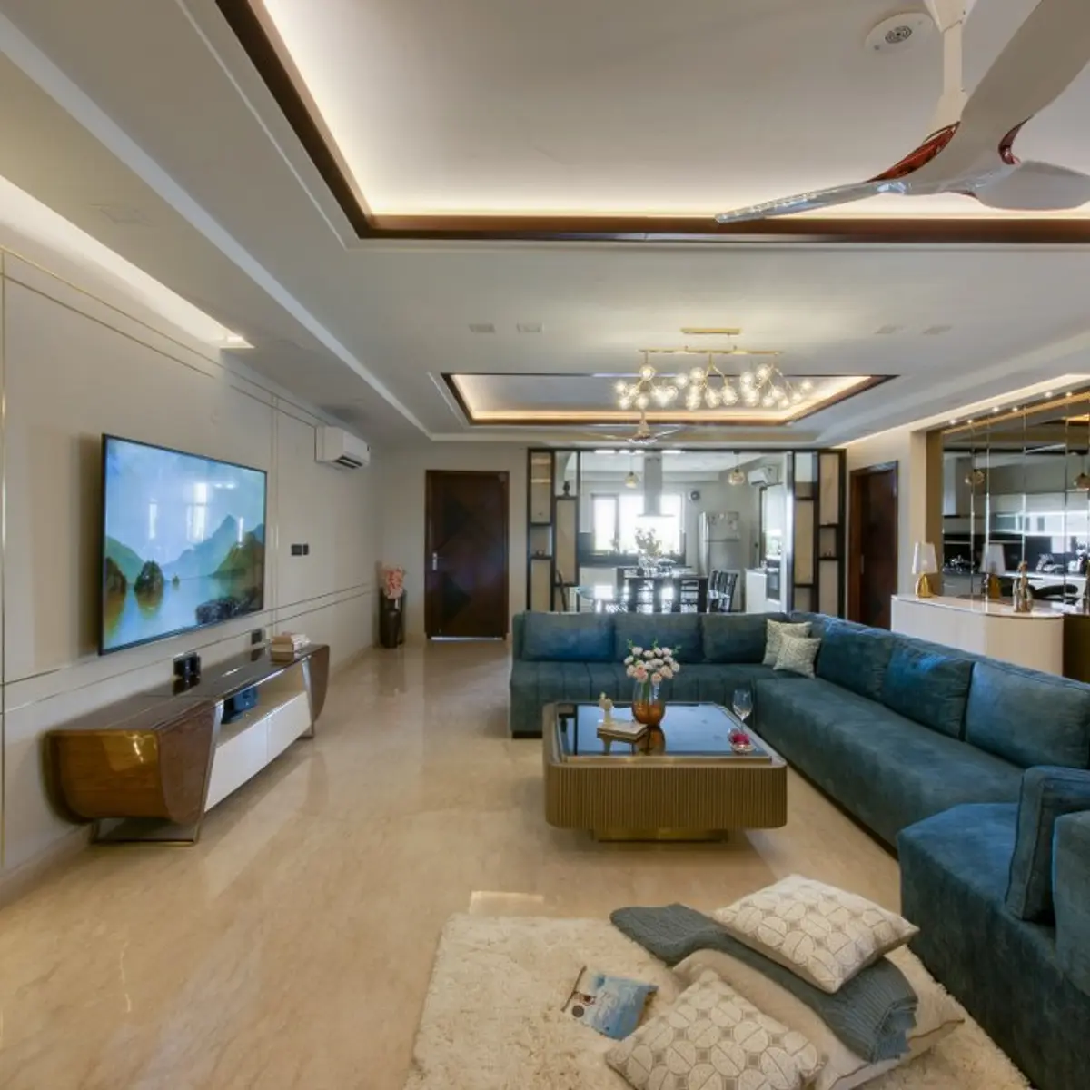 jewel tone luxury living room with tv unit — real Indian home