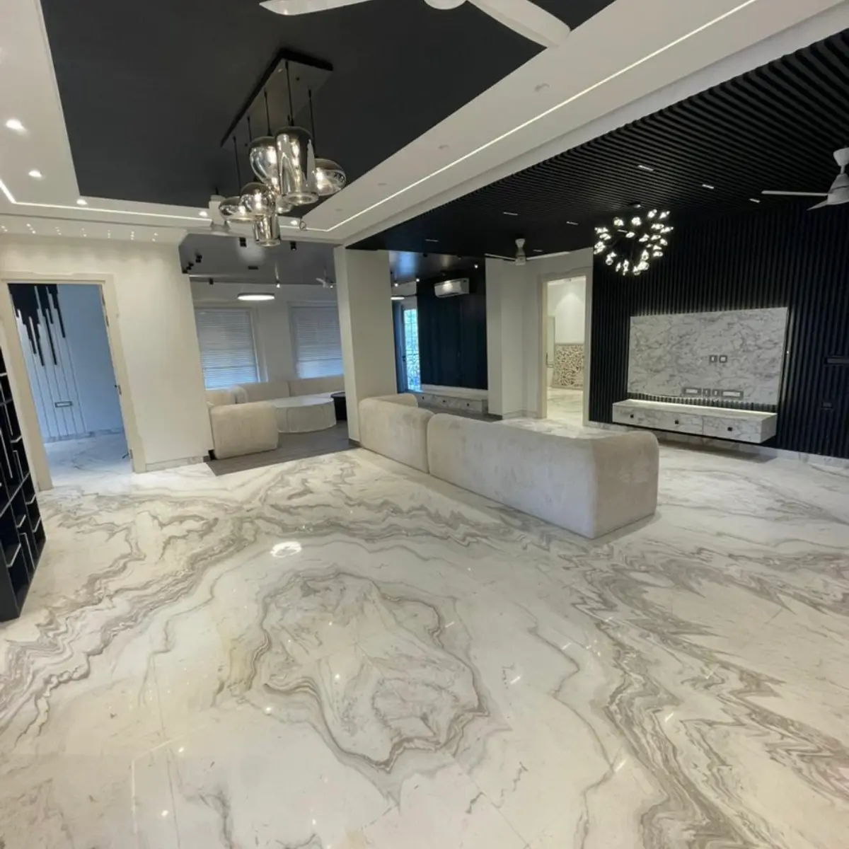 black and white luxury living room with cove — real Indian home