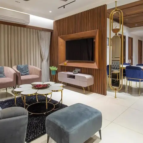 jewel tone modern indian living room with cladding — real Indian home