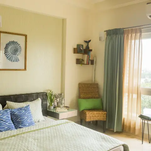 pastel boho master bedroom with bed — real Indian home