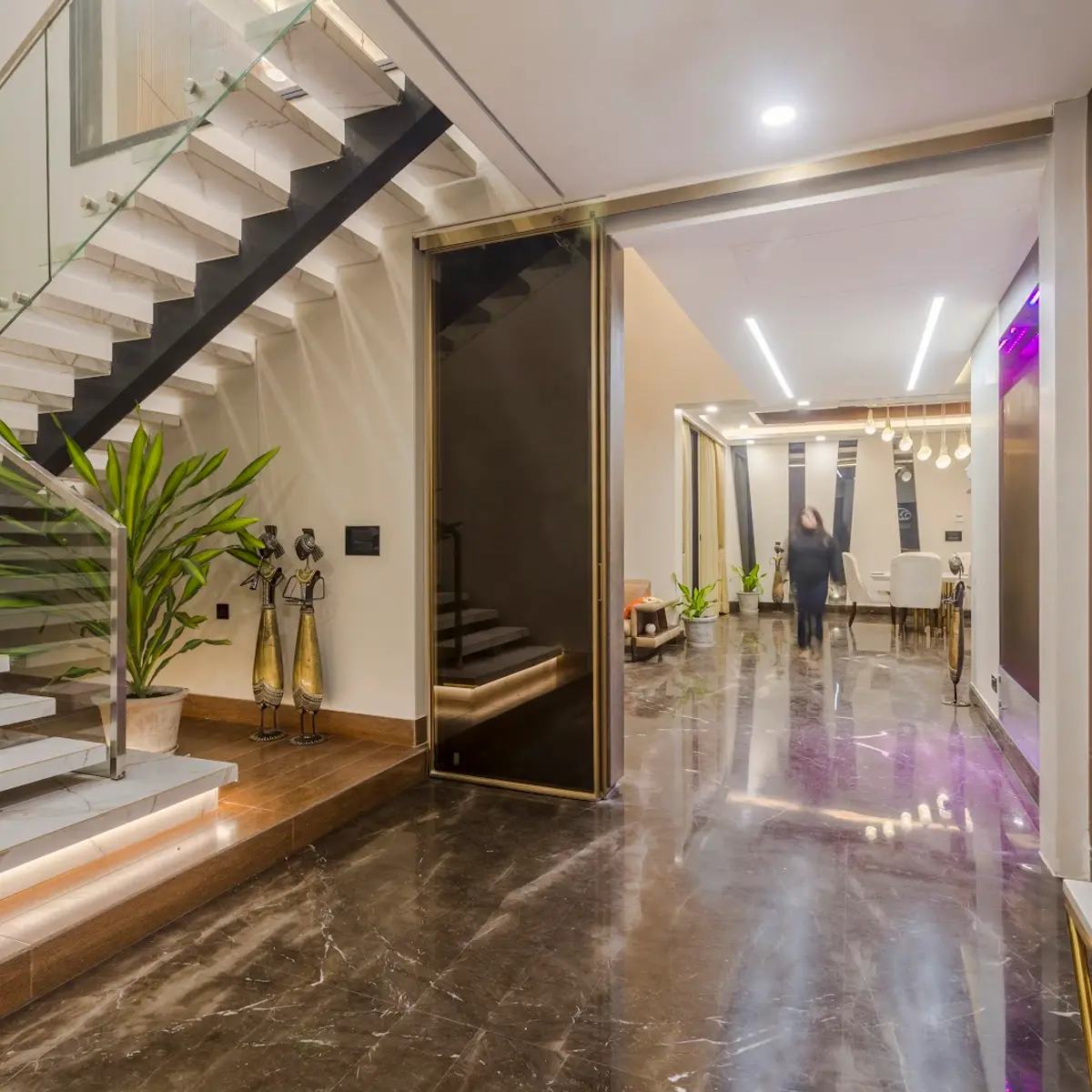 earthy luxury entrance foyer with marble — real Indian home