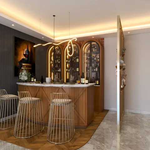 Home bar with arched backlit wine cabinets in wood and a marble-top counter ringed by gold wire-frame stools on a herringbone floor inset.