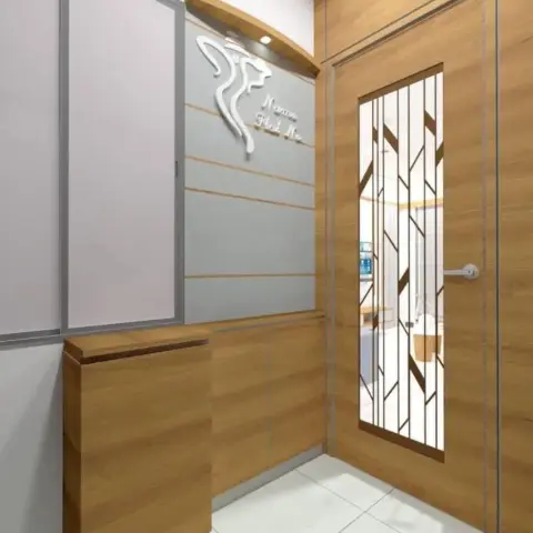 Home entrance render with a wood-panelled main door carrying a geometric glass insert, a lit nameplate signage above, and a matching wood shoe console.