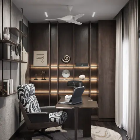 Home study with a dark wood slatted wall of backlit display shelving behind a built-in desk, a black-and-white patterned lounge chair