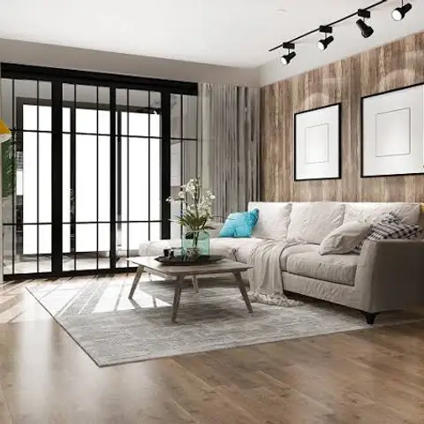 Industrial-style living room with a reclaimed-wood accent wall, black-framed sliding glass doors, a beige sectional sofa and track lighting.