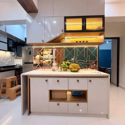 Ivory-gloss peninsula counter with hexagonal wood knobs and an open wicker-basket niche