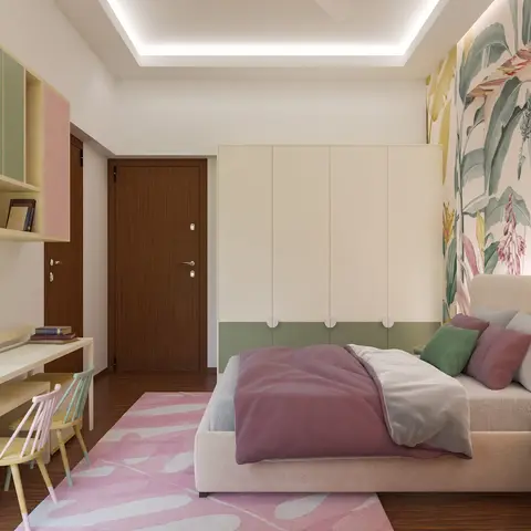 Kids' bedroom in blush pink and sage green with a botanical leaf-print wallpaper headboard wall, a color-blocked built-in wardrobe