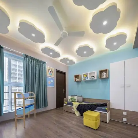 Kids' bedroom with a cloud-shaped cove-lit POP ceiling, a sky-blue accent wall, teal curtains and a storage bed with a yellow ottoman.