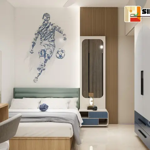 Kids' bedroom with a graphic footballer wall mural, a sage-green upholstered bed, a fluted wood accent panel