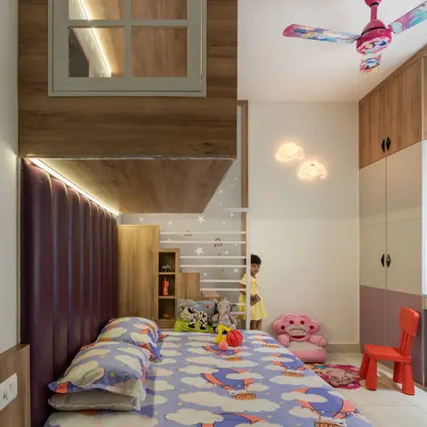 Kids' bedroom with a house-shaped mirror window above a purple padded headboard and a storage bed with drawers.