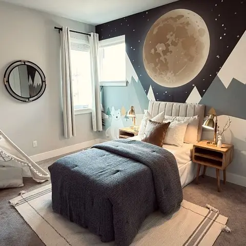 Kids bedroom with a moon-and-mountain mural feature wall, upholstered headboard bed and a white teepee play tent