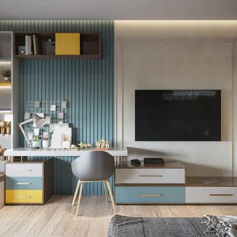 Kids' study nook with a teal fluted accent wall, a two-tone drawer desk, and a wall-mounted TV above a matching console.