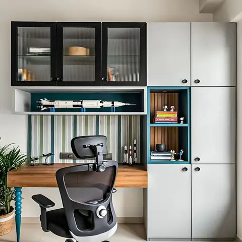 Kids' study nook with a wall-hung timber desk, tall glass-and-laminate storage unit, and a teal display niche holding toys and books.