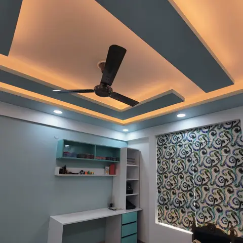 Kids/teen bedroom with a dramatic multi-tier POP false ceiling in cove-lit blue-grey and white, a teal built-in study desk with open shelving