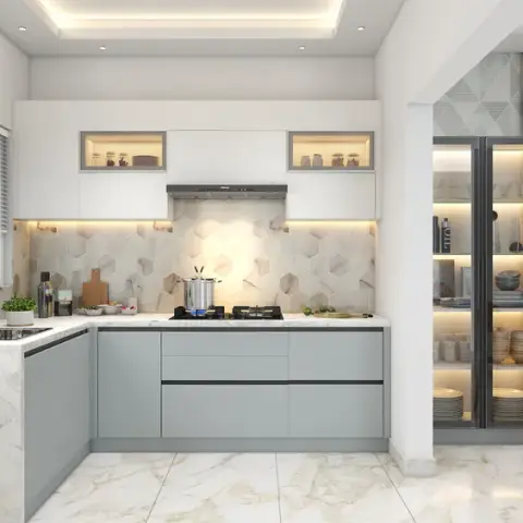 L-shaped kitchen render in dusty blue-grey handleless base units under a veined marble counter, with a hexagon mosaic splashback