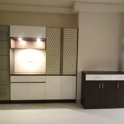Living room display and storage unit with a glass-shelf display cabinet, a backlit niche shelf and patterned floral shutters