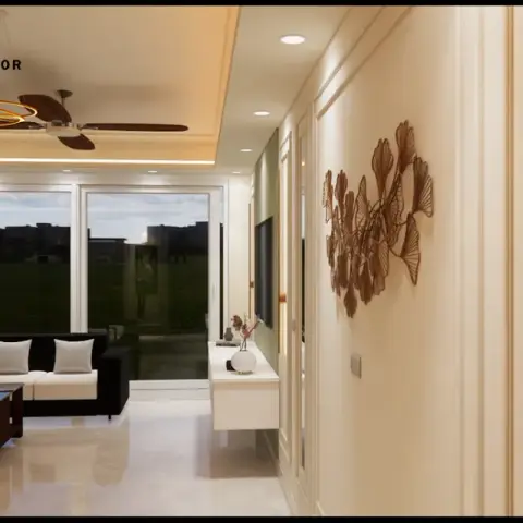 Living-room hallway with a cove-lit ceiling, a black sofa set and a large metal leaf wall sculpture facing a mirrored console.
