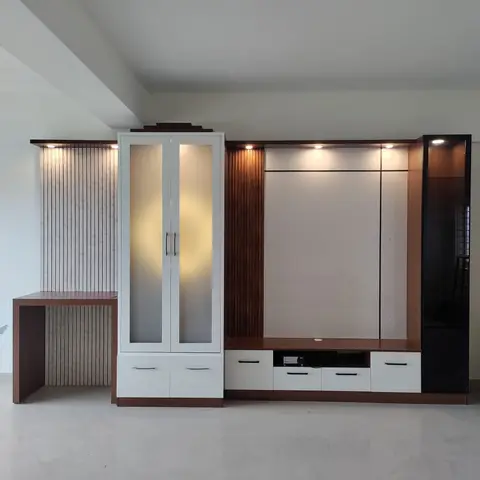 Living room joinery wall combining a frosted-glass double-door wardrobe, a fluted-panel TV unit in dual-tone walnut and white lacquer