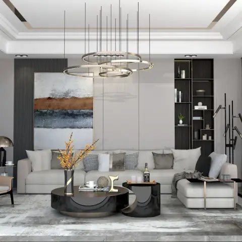 Living room render with a multi-ring brass chandelier over a grey sectional sofa, nested round coffee tables