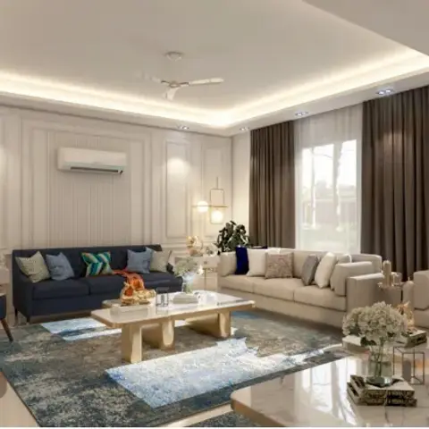 Living room render with cream panel-moulded walls and a fluted band behind the AC, a navy three-seater facing two beige sofas across a distressed teal rug