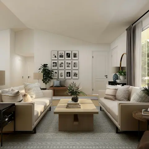 Living room render with two facing cream sofas around a wood coffee table, a black-and-white photo gallery wall, patterned area rug
