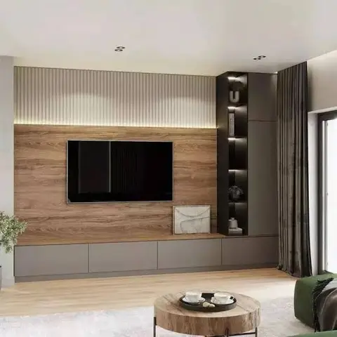Living room TV feature wall with a backlit fluted panel above, a wood-veneer TV unit, and a dark display niche beside floor-length curtains.