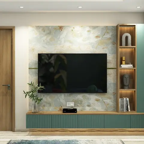 Living room TV wall clad in cream-and-gold onyx-look marble panelling with a wall-mounted TV, a fluted teal-green low console below