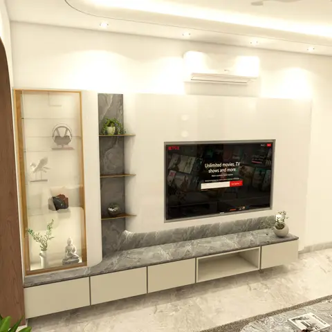 Living room TV wall in glossy white with a grey marble accent strip, glass-fronted curio cabinet displaying figurines and a floating marble-top media console