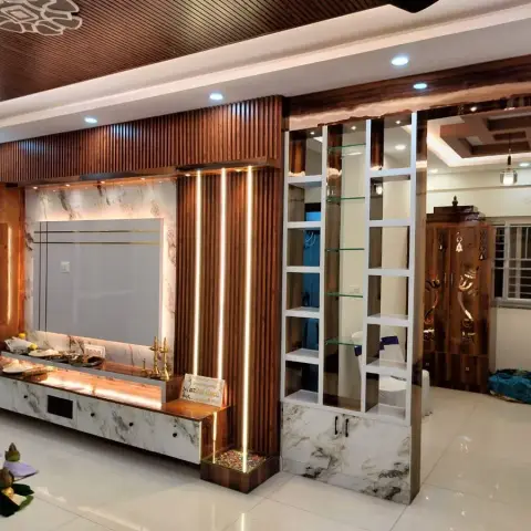 Living-room TV wall in veined white porcelain with gold inlay lines, wrapped in teak fluted louvres and backlit vertical LED slots