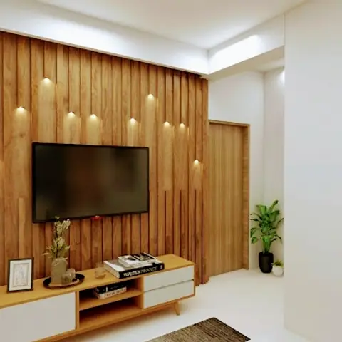 Living room TV wall in vertical fluted wood panelling with recessed accent lights and a low wooden console styled with books and a plant.