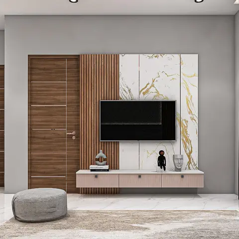 Living room TV wall pairing vertical wood fluting with a gold-veined marble panel, above a blush floating console with a white marble top.