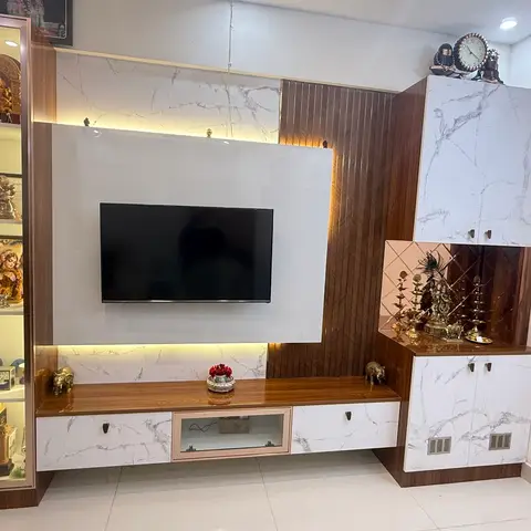 Living room TV wall unit with a marble-panel backsplash, fluted wood accent strip, LED backlighting, a glass-front trophy display cabinet