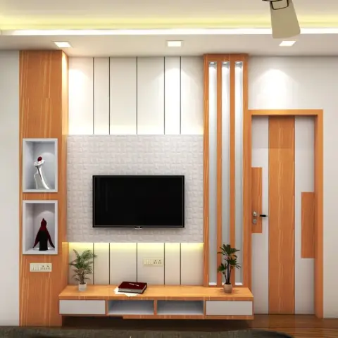 Living room TV wall with vertical wood panelling, a textured white tile backdrop behind the TV, and an orange-toned wood main door alongside a slatted screen.