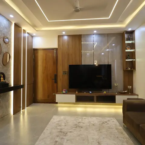 Living room with a backlit onyx accent wall featuring clustered round mirrors and a Buddha console