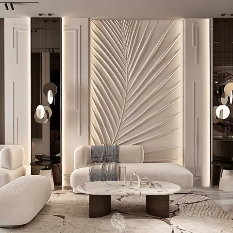 Living room with a backlit sculpted palm-leaf feature wall behind cream bouclé sofas and a round marble coffee table on dark timber legs.