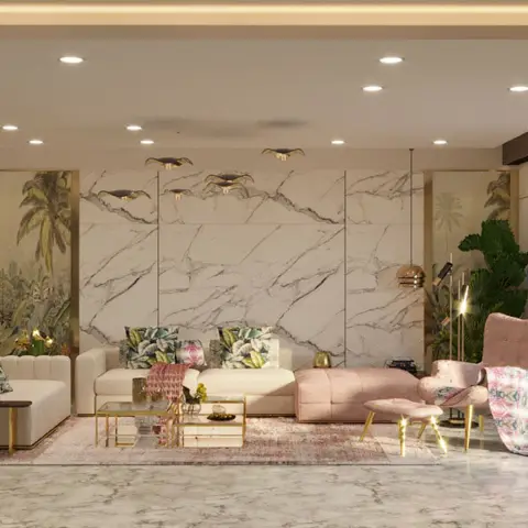 Living room with a book-matched marble slab feature wall flanked by tropical-print wallpaper panels, a blush pink wing chair beside a cream sofa