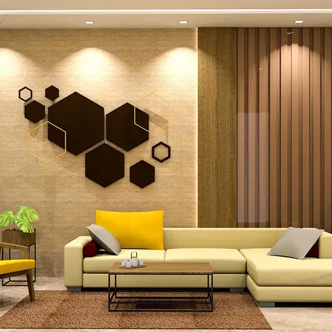 Living room with a cluster of dark hexagonal 3D wall art panels over a mustard-yellow L-shaped sofa and matching accent armchair.