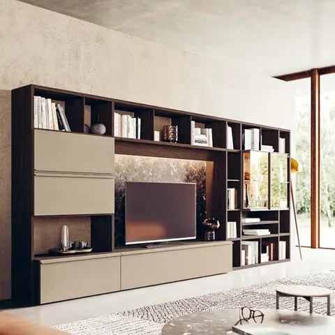 Living room with a dark walnut and beige TV wall unit featuring open bookshelves and a backlit textured stone panel behind the television