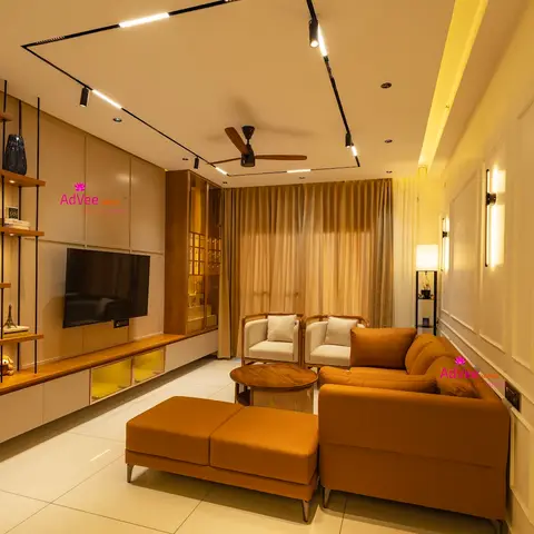 Living room with a floating wood-and-white TV console with backlit glass drawers, an open ladder-style display shelf
