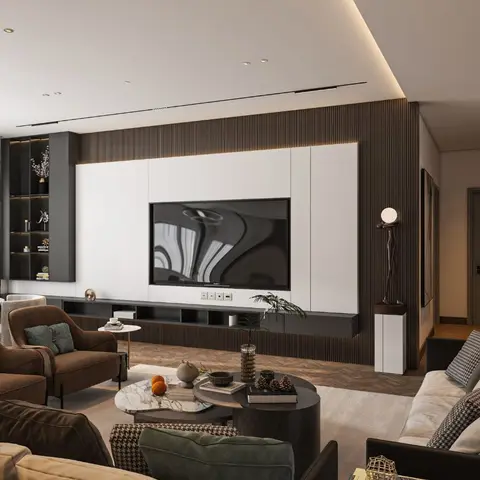 Living room with a fluted dark-wood TV feature wall, cove-lit ceiling and mixed velvet-and-boucle seating around a round marble coffee table.
