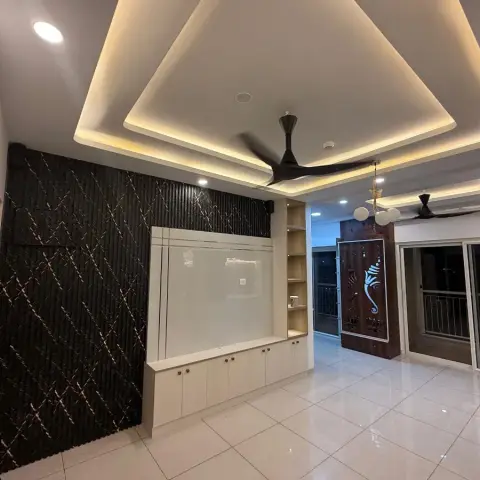 Living room with a fluted dark-textured TV feature wall, a layered cove-lit pop ceiling
