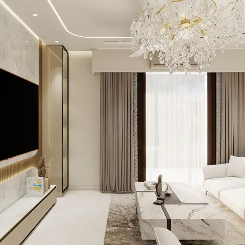 Living room with a marble-and-brass TV feature wall, a crystal cluster chandelier, and a white sofa facing a marble waterfall-edge coffee table.