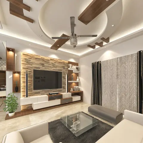 Living room with a multi-tier cove-lit POP false ceiling with wooden fin accents, a stone-clad TV feature wall, and a white gloss TV console.