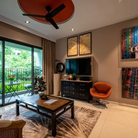 Living room with a red fan medallion on the ceiling, a black vintage-style dresser doubling as a TV console, an orange swivel chair